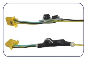 One harness branch off a yellow connector photographed twice: above, a small in-line component sitting bare on the yellow-green cores; below, a black sleeve printed GDWH-3 recovered over that position and down onto the cable at both ends